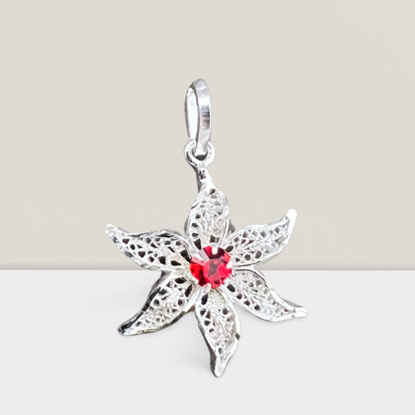 Pendentif ylang avec pierre rouge